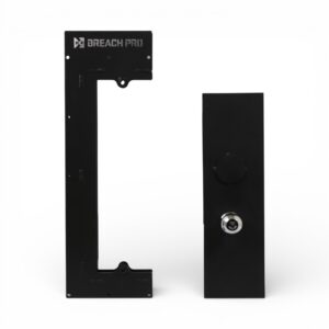 MBI Door Panel Insert Receiver (MBI-DR) and Multi-Method Breaching Insert (MBI-M) displayed side by side on a white background. Precision-fabricated steel components designed for realistic mechanical, ballistic, and explosive breaching training using standard residential door panels.