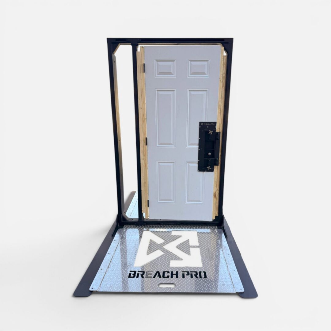 Breach Pro adjustable breaching frame with replaceable wood jamb system, designed for SWAT, military, and law enforcement breaching training using real residential and commercial doors.